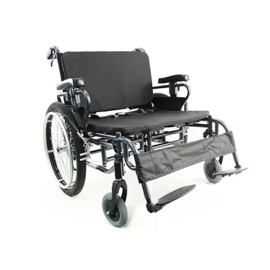 The Karman KM-BT10 Extra Wide Wheelchair features black upholstery, a wide seat, sturdy frame, armrests, footrests, all-terrain rear wheels, and small front casters for bariatric use and easy mobility.